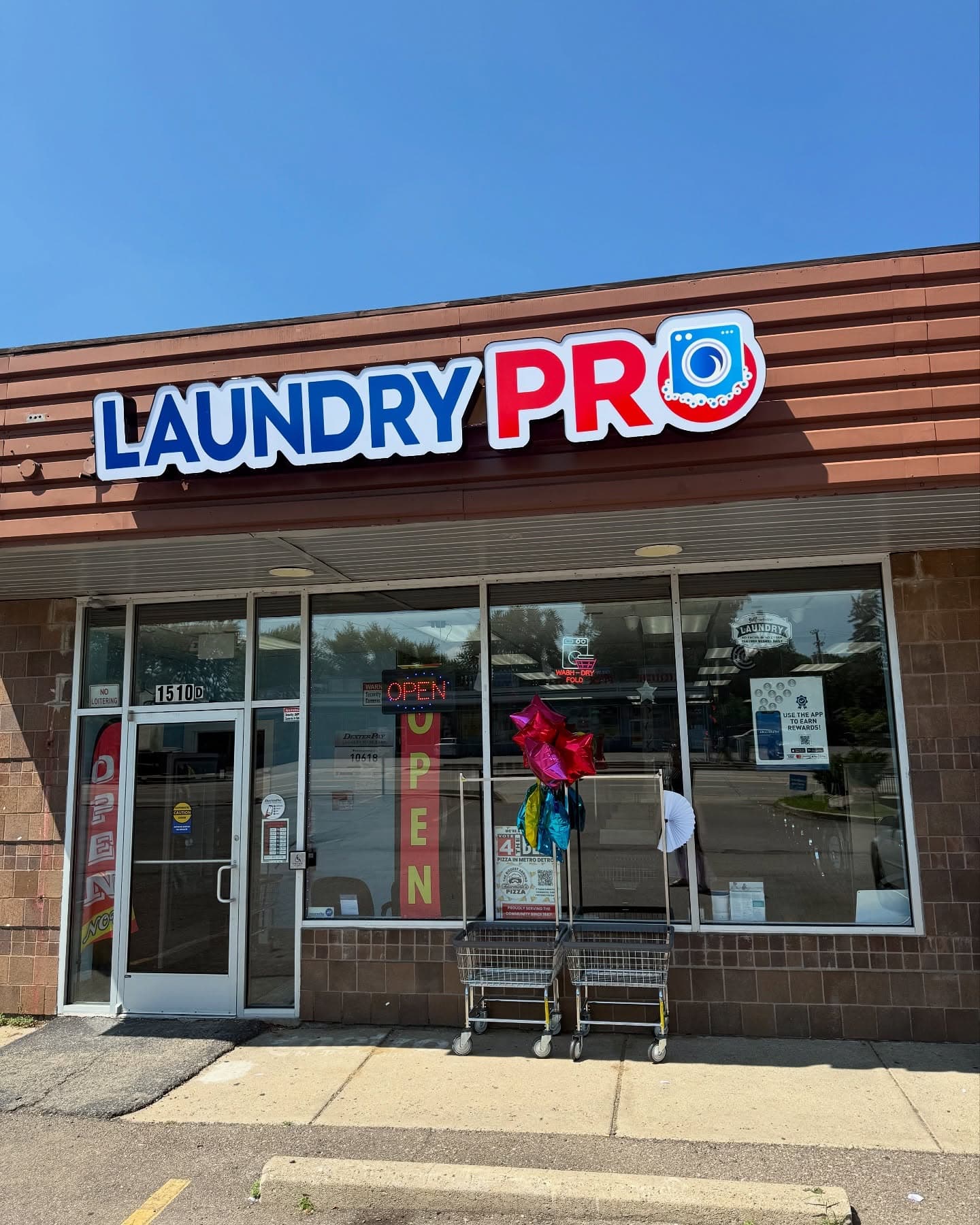 Laundry supplies and folded towels suggesting affordable laundry habits at Laundry Pro Ypsilanti Michigan